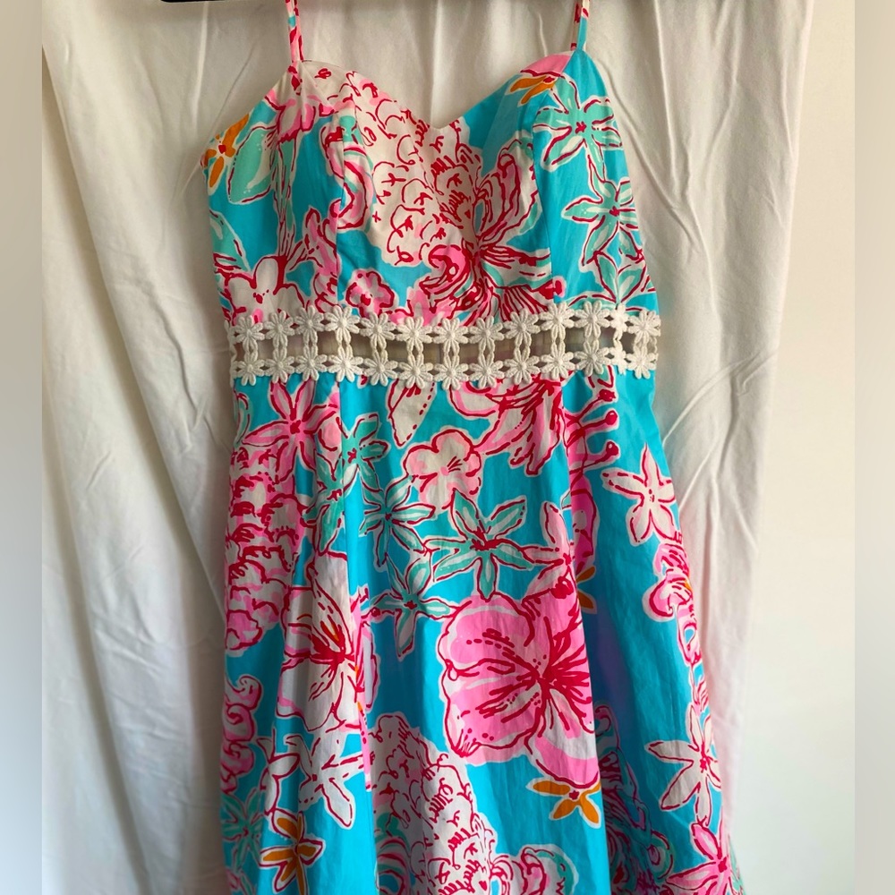 Lily Pulitzer dress with peek-a-boo lace at waist. Very good condition.